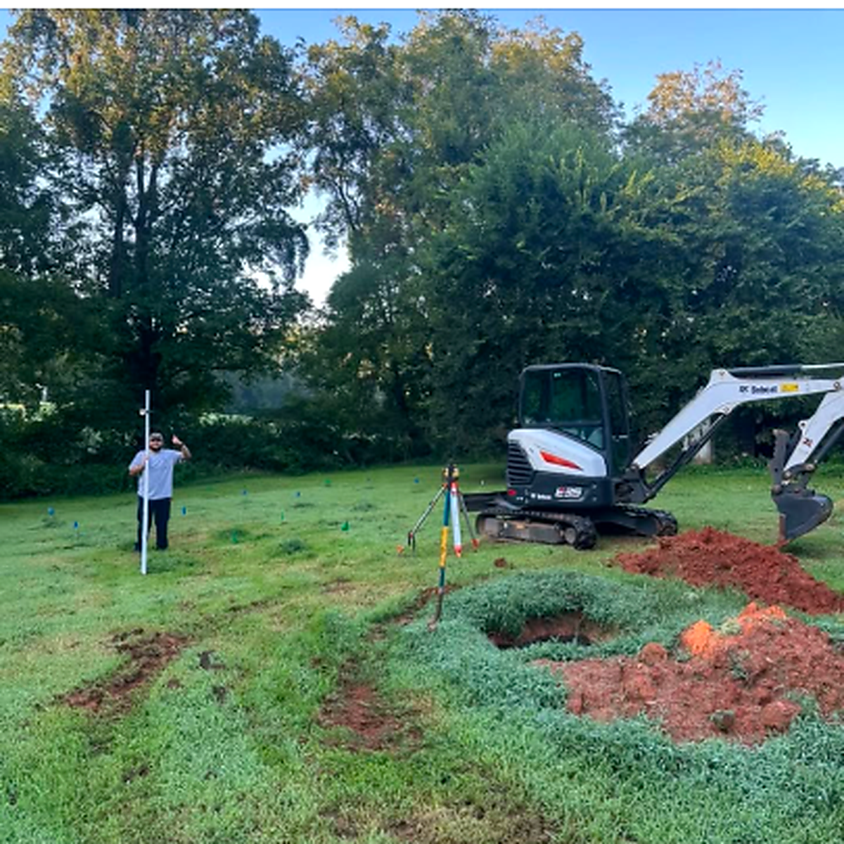 Excavator working on a North Wilkesboro property